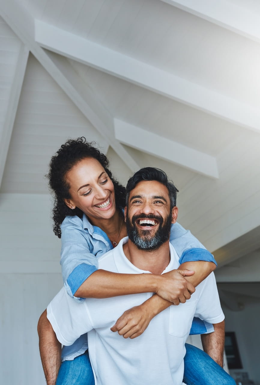 A happy couple in their new home