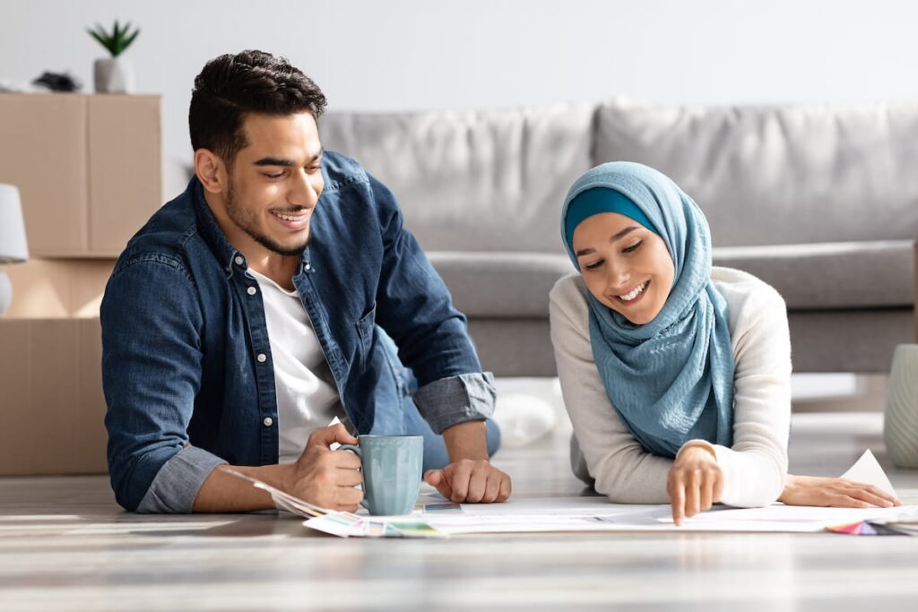 Couple reviewing floor plans